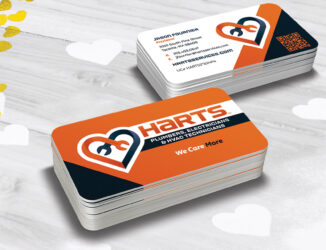 harts business cards on top of white and gold heart shaped confetti