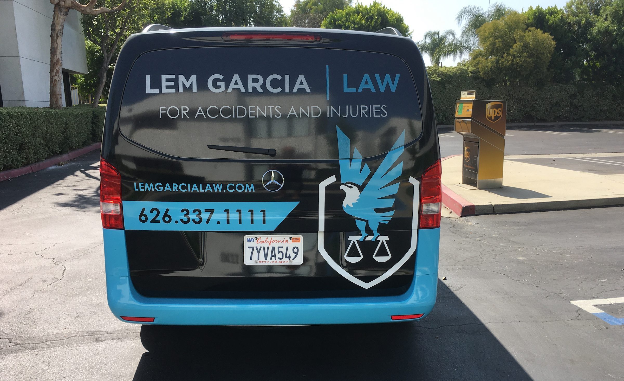 Vehicle wrap design for Lem Garcia Law, a California-based law firm.