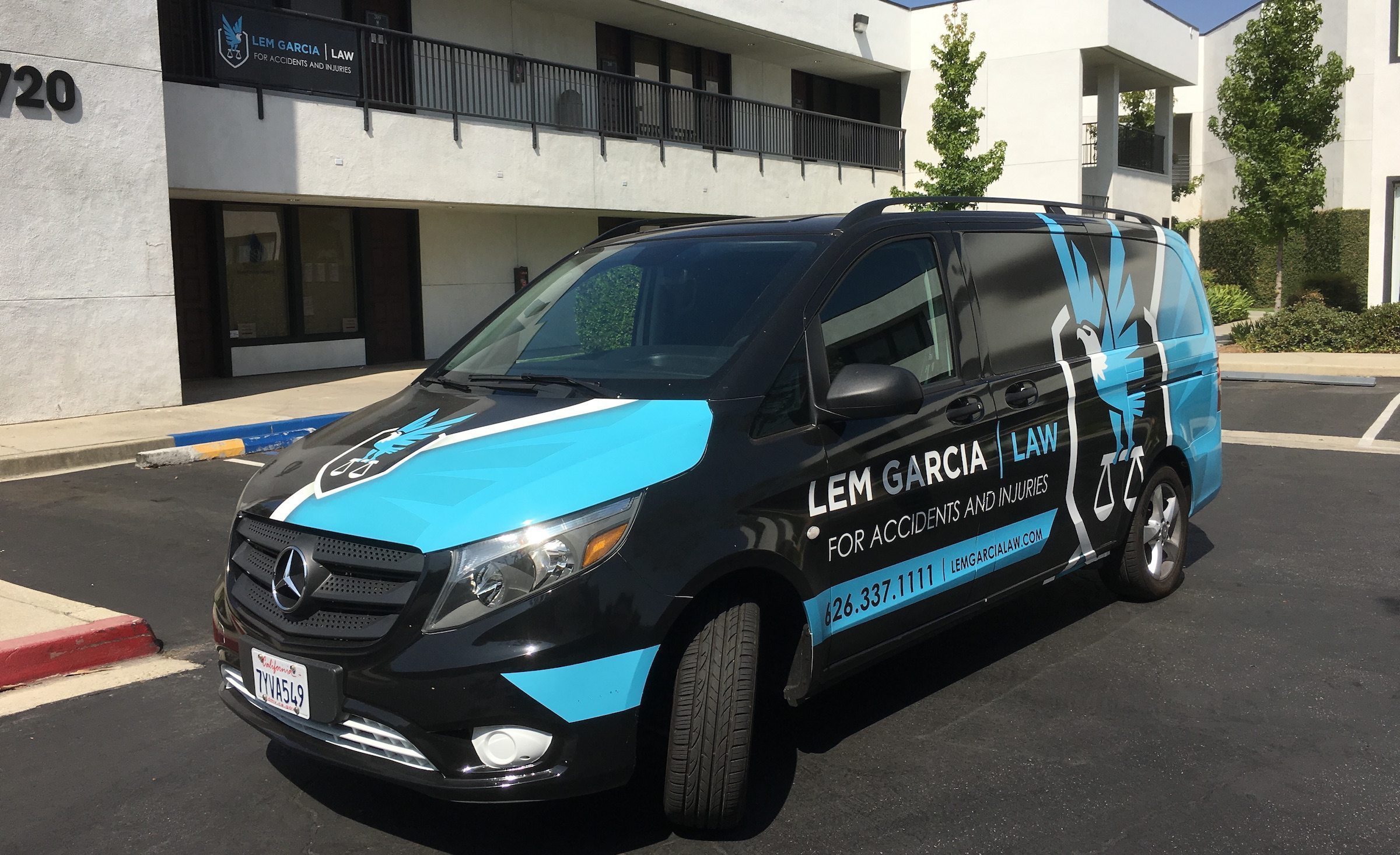Vehicle wrap design for Lem Garcia Law, a California-based law firm.